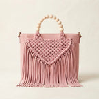 Pink fringe shoulder bag with tassels, front view