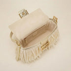 Interior lining and pockets of Cream fringe shoulder bags designer