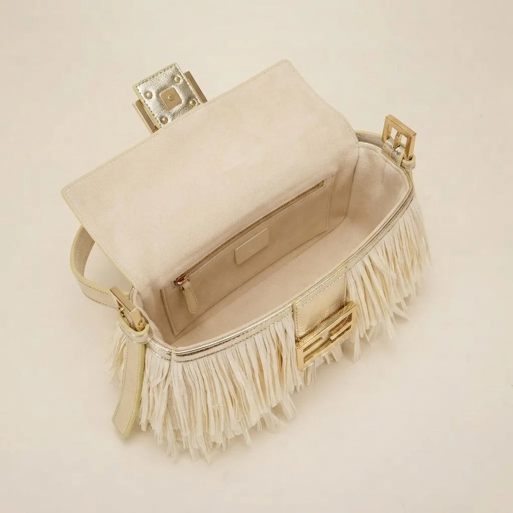 Interior lining and pockets of Cream fringe shoulder bags designer
