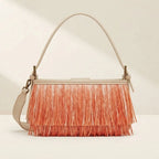 Back panel of Orange fringe shoulder bags designer with strap attachments
