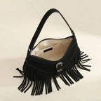 Interior lining and pockets of Black fringe sling bag
