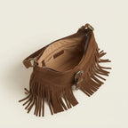Interior lining and pockets of Brown fringe sling bag