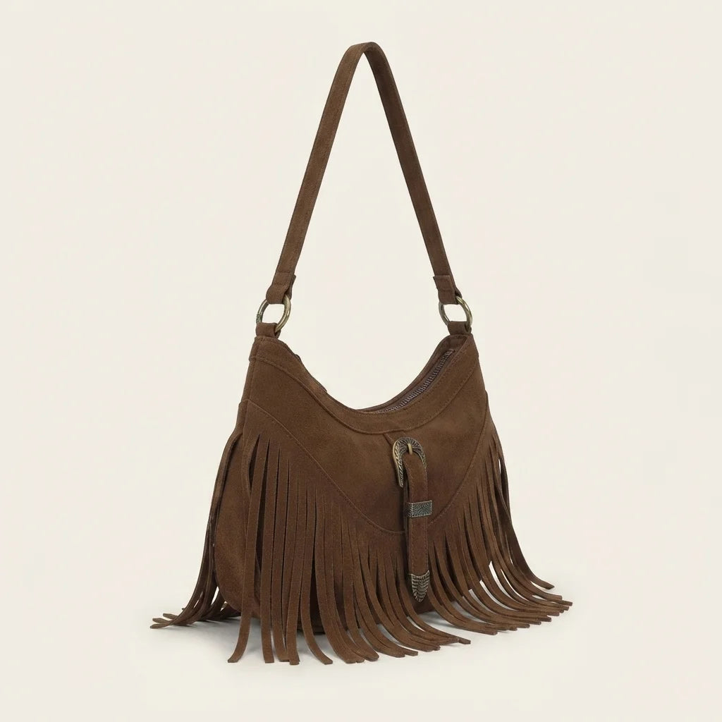 Brown fringe sling bag, three-quarter angle showing side depth