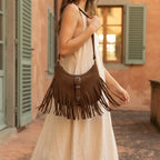 Woman wearing Brown fringe sling bag with swaying fringe