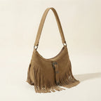Khaki fringe sling bag, three-quarter angle showing side depth