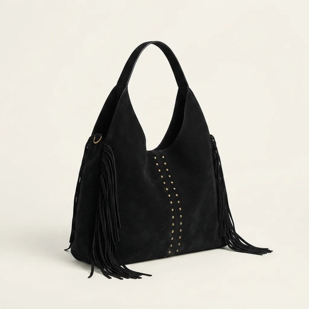 Black fringe studded bag, three-quarter angle showing side depth