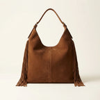 Back panel of Brown fringe studded bag with strap attachments