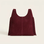 Back panel of Burgundy fringe studded bag with strap attachments