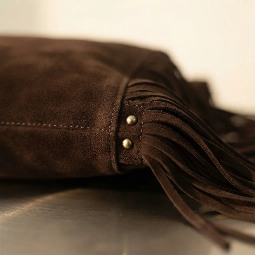 Close-up of fringe stitching and texture on Coffee fringe studded bag