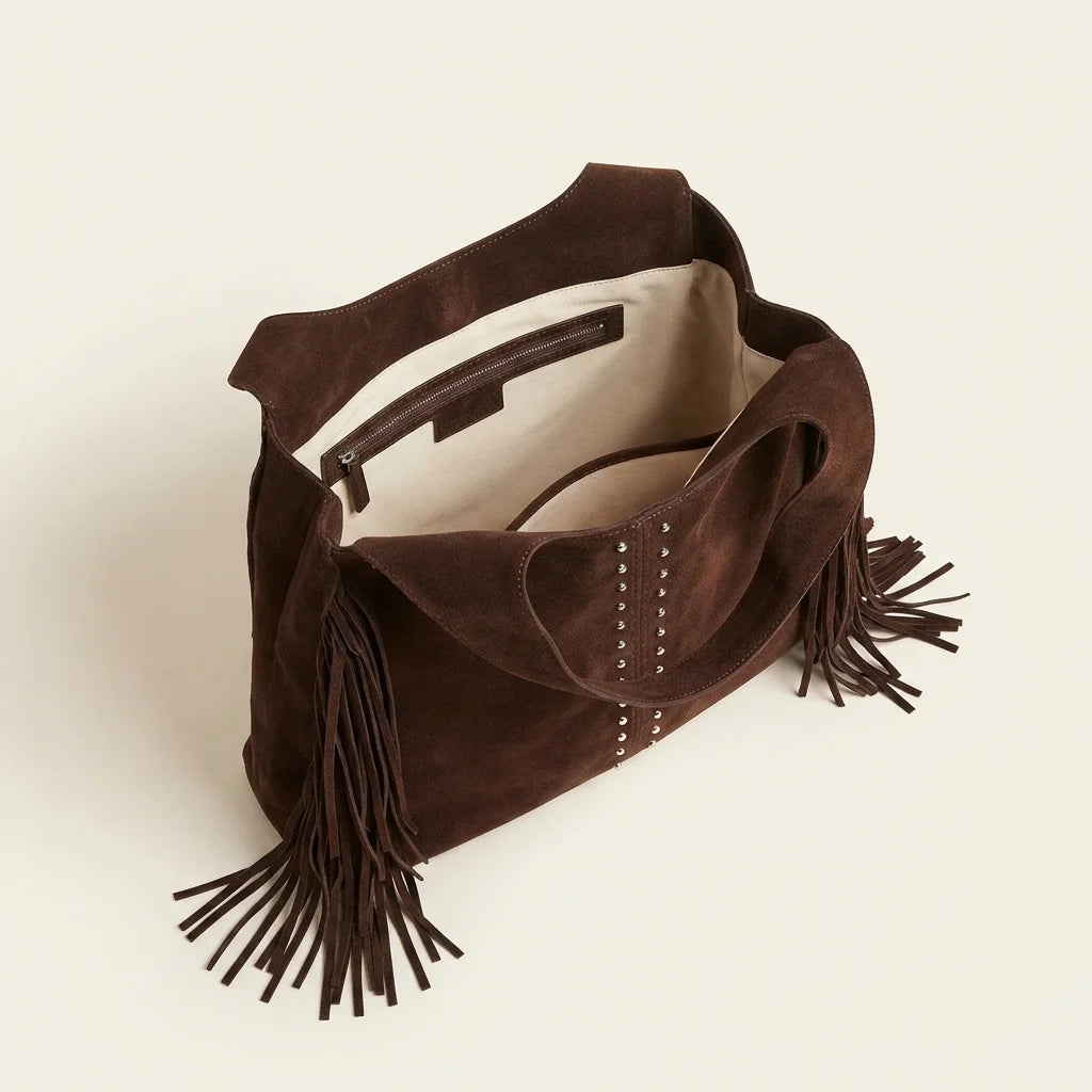 Interior lining and pockets of Coffee fringe studded bag