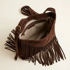 Interior lining and pockets of Brown fringe suede belt bag