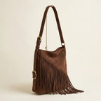 Brown fringe suede belt bag, three-quarter angle showing side depth