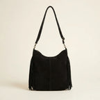 Back panel of Black fringe tassel crossbody bag with strap attachments