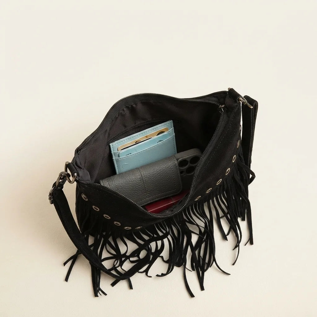 Interior lining and pockets of Black fringe tassel crossbody bag