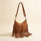 Brown fringe tassel crossbody bag, three-quarter angle showing side depth