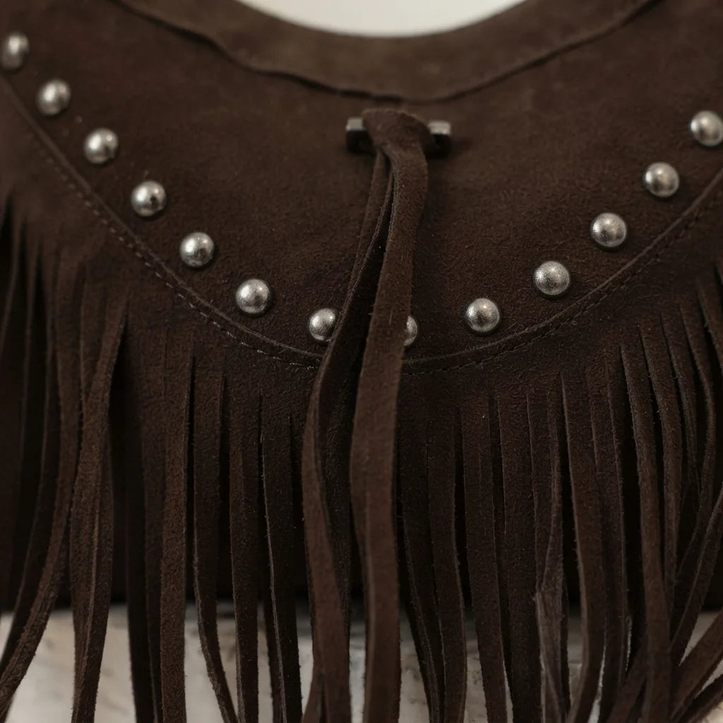 Close-up of fringe stitching and texture on Coffee fringe tassel crossbody bag