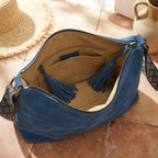 Interior lining and pockets of Blue fringe tassel shoulder bag