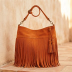 Back panel of Orange fringe tassel shoulder bag with strap attachments
