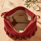 Interior lining and pockets of Red fringe tassel shoulder bag