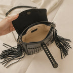 Interior lining and pockets of Black fringe tassel small bag