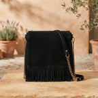 Back panel of black fringed-shoulder-bag-black-and-white with strap attachments