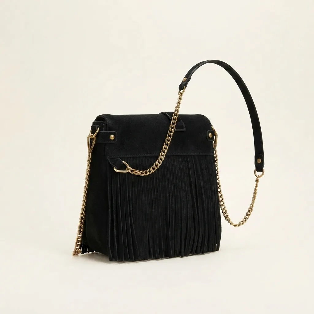 black fringed-shoulder-bag-black-and-white, three-quarter angle showing side depth