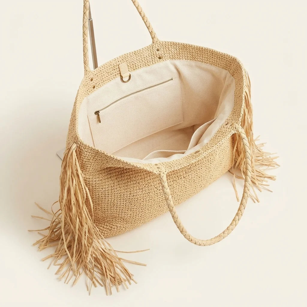Interior lining and pockets of Natural fringed straw tote bag