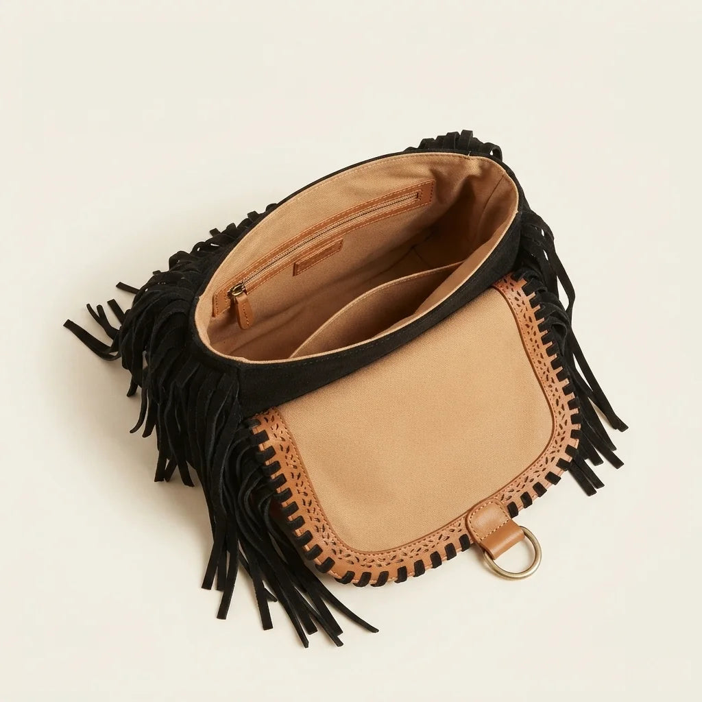 Interior lining and pockets of Black fringed suede sling bag