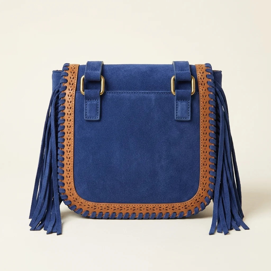 Back panel of Blue fringed suede sling bag with strap attachments