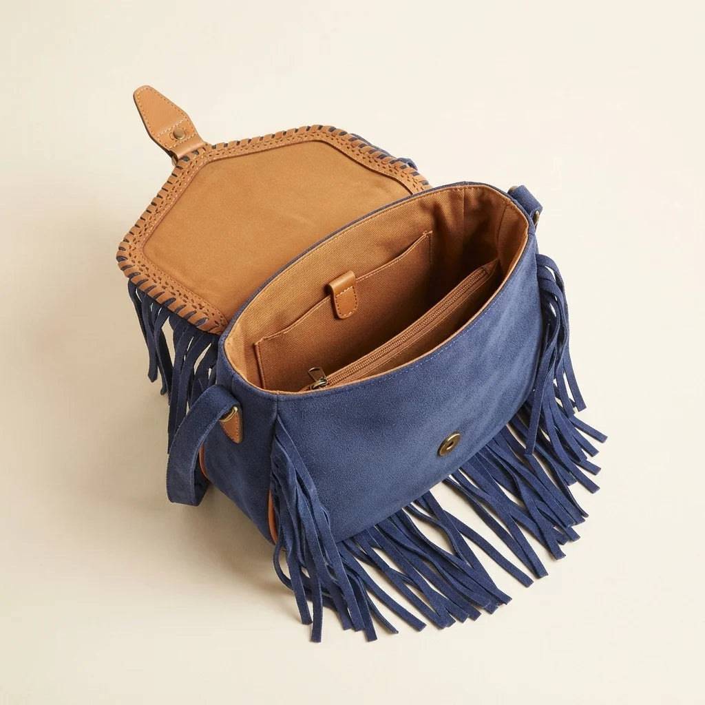 Interior lining and pockets of Blue fringed suede sling bag