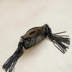 Interior lining and pockets of Black genuine leather fringe bag