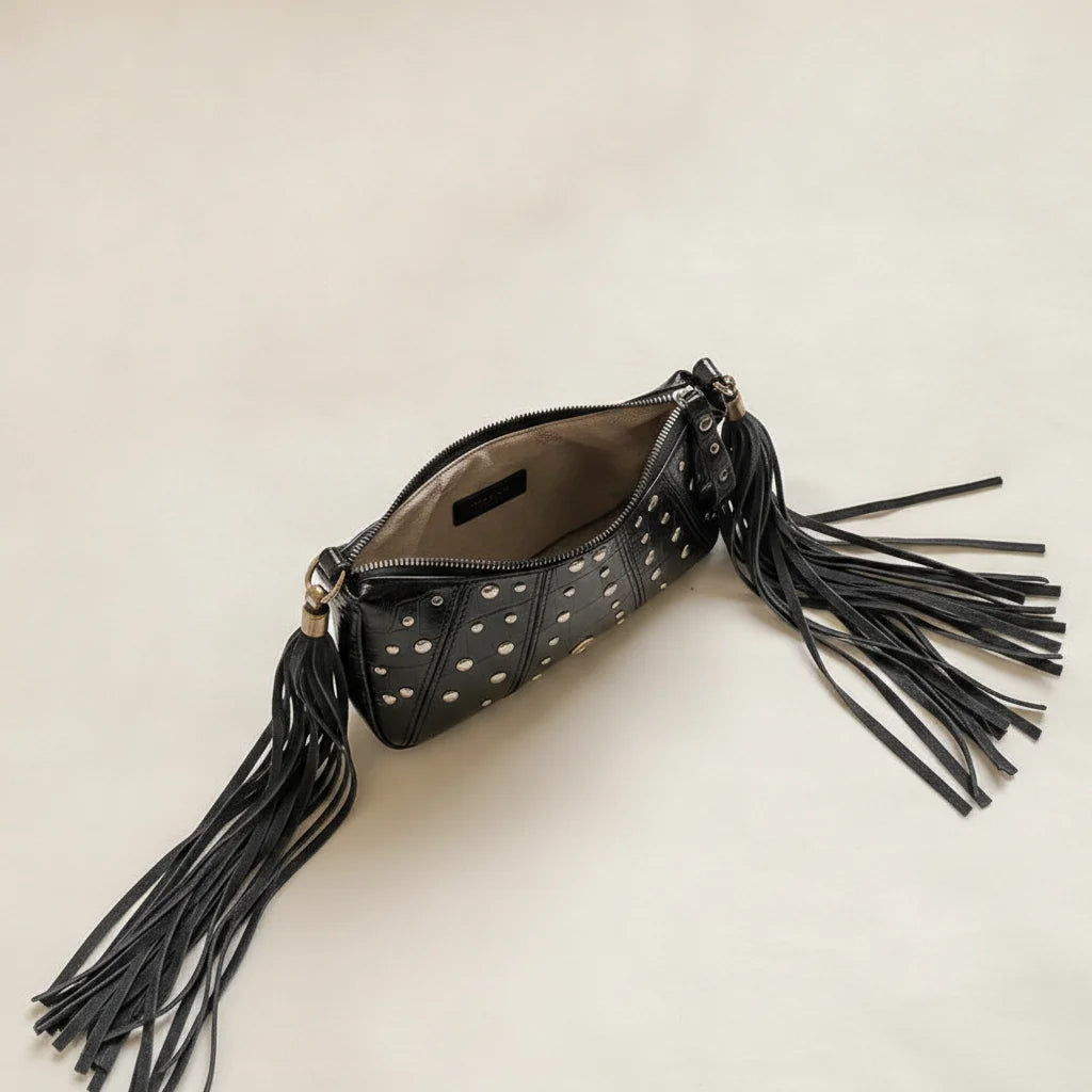 Interior lining and pockets of Black genuine leather fringe bag