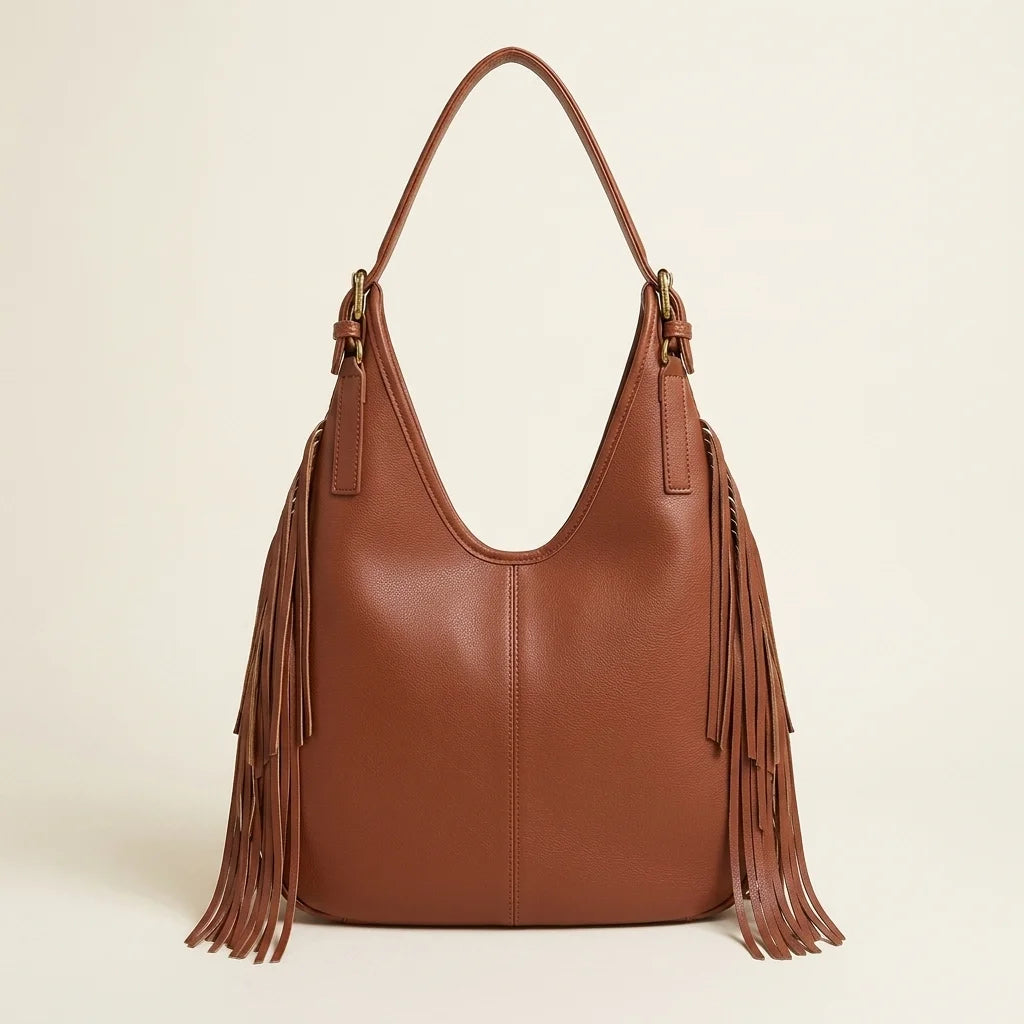 Back panel of Brown genuine leather fringe hobo bag with strap attachments