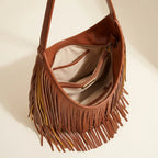 Interior lining and pockets of Brown genuine leather fringe hobo bag