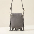 Back panel of Grey gray crossbody bag fringe with strap attachments