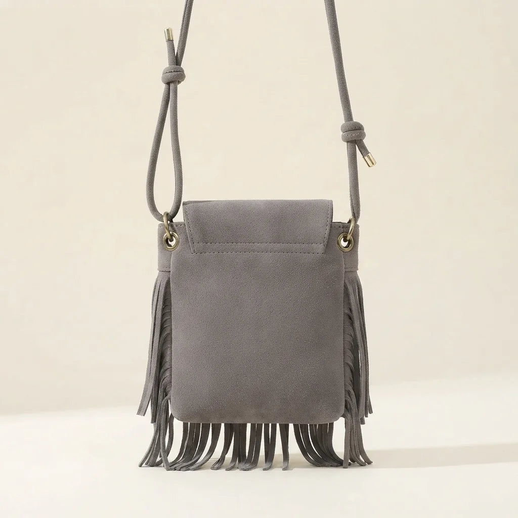 Back panel of Grey gray crossbody bag fringe with strap attachments