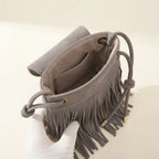 Interior lining and pockets of Grey gray crossbody bag fringe