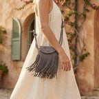 Woman wearing Grey gray crossbody bag fringe with swaying fringe
