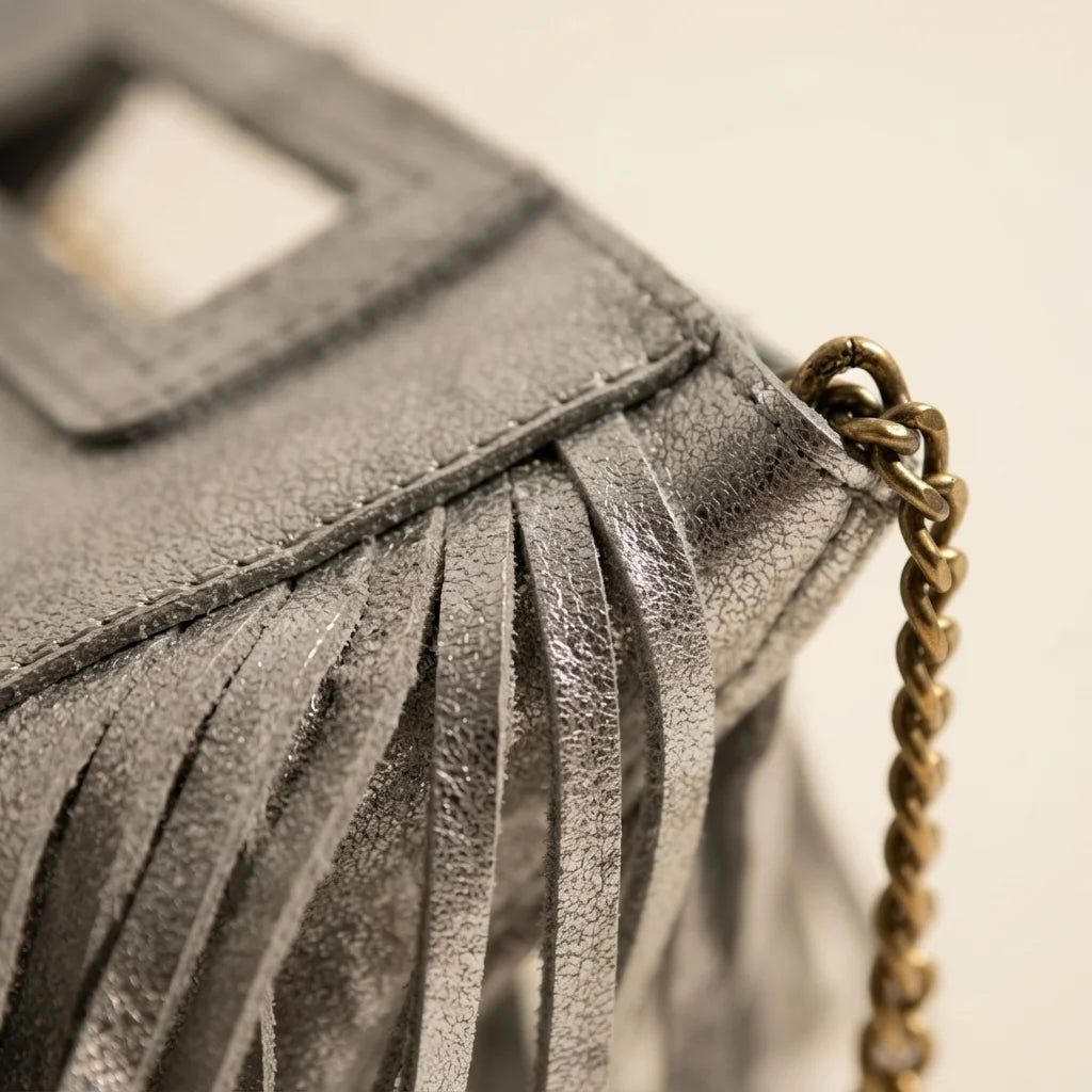 Close-up of fringe stitching and texture on Silver gray fringe satchel bag