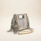 Silver gray fringe satchel bag, three-quarter angle showing side depth
