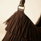Close-up of fringe stitching and texture on Coffee hippie fringe bag