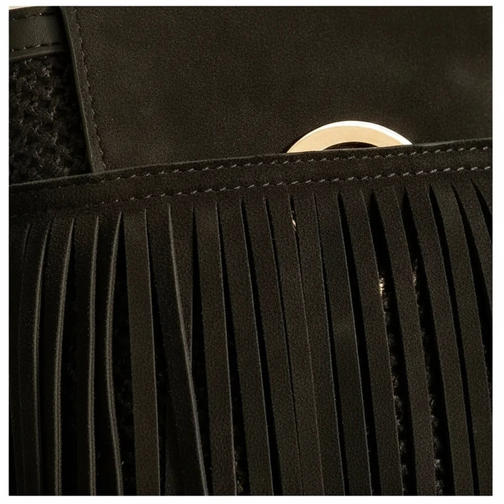 Close-up of fringe stitching and texture on Black hippie fringe crossbody bag