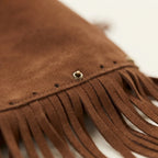 Close-up of fringe stitching and texture on Brown large brown fringe bag