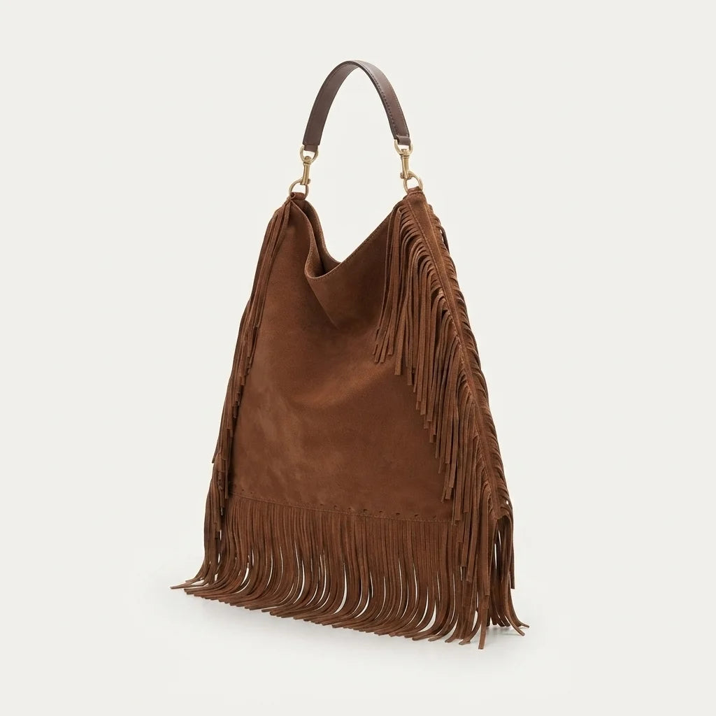 Brown large brown fringe bag, three-quarter angle showing side depth