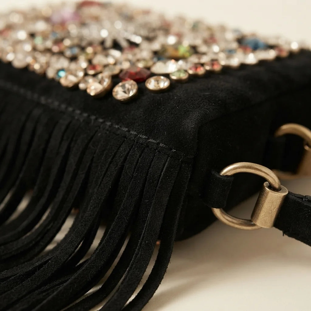 Close-up of fringe stitching and texture on Black large fringe clutch bag