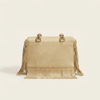 Back panel of Gold large fringe clutch bag with strap attachments