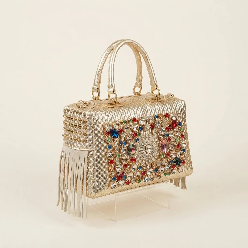 Gold large fringe clutch bag, three-quarter angle showing side depth