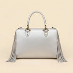 Back panel of Silver large fringe clutch bag with strap attachments