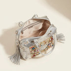 Interior lining and pockets of Silver large fringe clutch bag