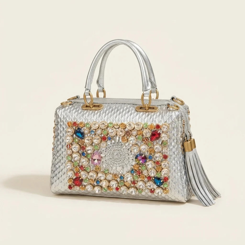 Silver large fringe clutch bag, three-quarter angle showing side depth